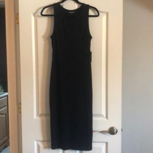 Form fitting LBD. Falls just below the knee